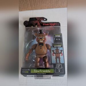 FNAF Five Nights at Freddy’s Toy Freddy Action Figure package is little damaged